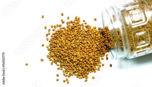 fenugreek seeds or methi dana isolated on white background