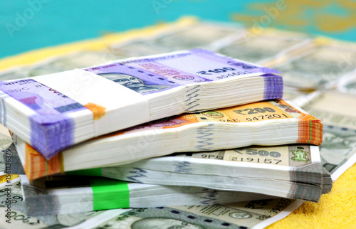 piles of new indian currency notes rupees 50,100,200 and 50