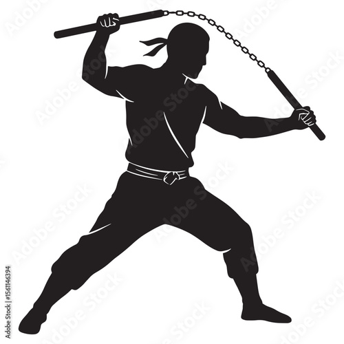 Silhouette of a martial arts fighter skillfully wielding nunchucks during training