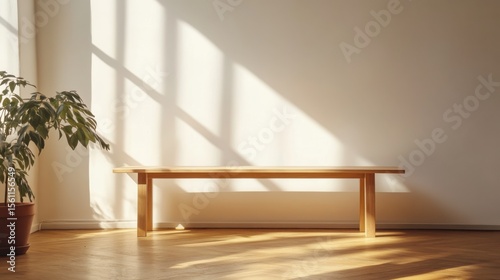 Wooden bench with plant in serene indoor setting