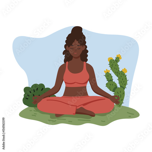 Meditating Woman in Coral Outfit Sitting Calmly Near Cactus