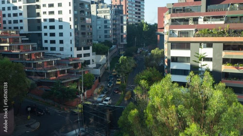 Time-lapse of panoramic view of car traffic on the streets of the northern part of Quito during the morning - Ecuador