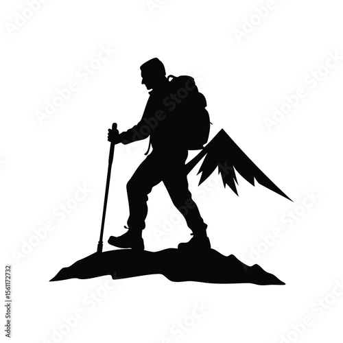 Silhouette of a hiker trekking on a mountain with a backpack