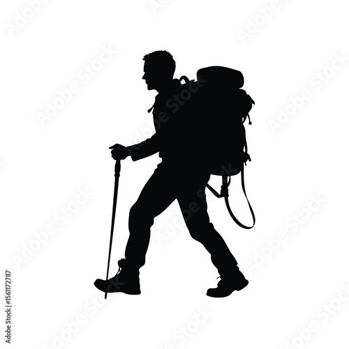 Silhouette of a hiker walking with a backpack and trekking pole.