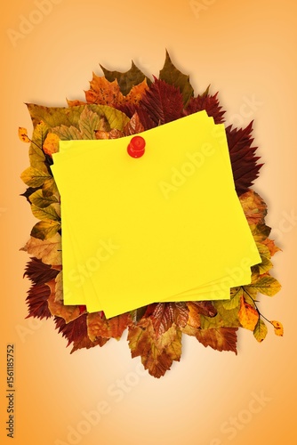 Autumn leaves with yellow note