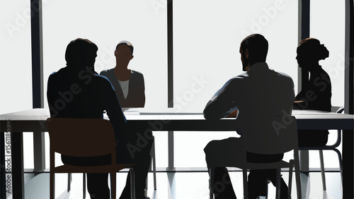 Silhouetted figures of business people sitting around a table in a bright conference room setting indoors