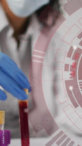 Scientist handling test tubes with futuristic data processing animation over laboratory scene