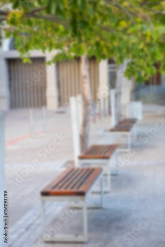 Defocused image of empty benches