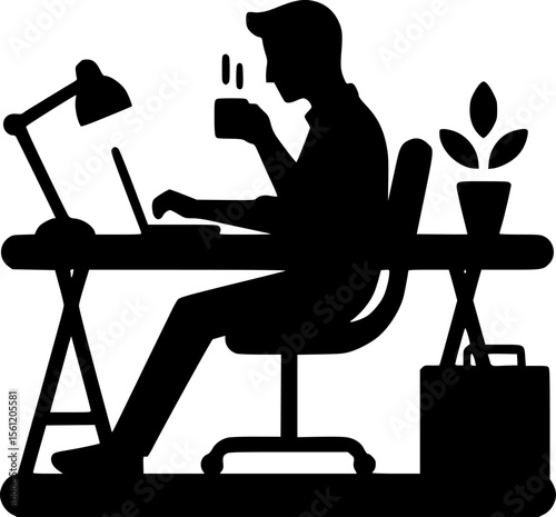 Silhouette of someone working late at desk with coffee cup