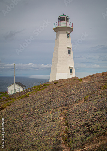 Cape Spear lighthouse with cloud rolling in on the coast in the Canadian Maritime province Newfoundland.