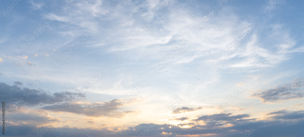 Fototapeta premium Beautiful morning or evening blue and orange sky with cloudy while sunsets or sunrises taken at the sea used as natural blackground texture
