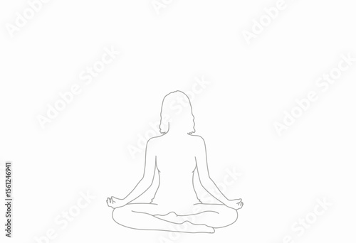 Woman meditating in lotus position with calming expression  