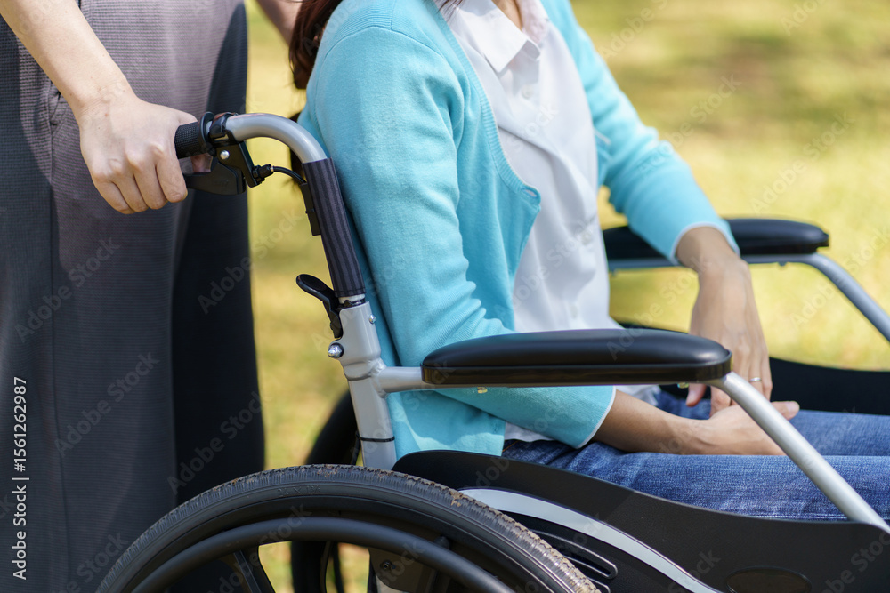 Obraz premium Depressed sad asian woman in wheelchair&nbsp;lonely disabled adult