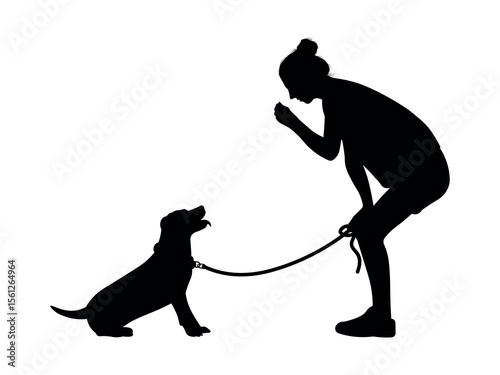 Silhouette of a Young Woman Bonding with Her Dog - A Touching Moment of Trust, Affection, and Companionship