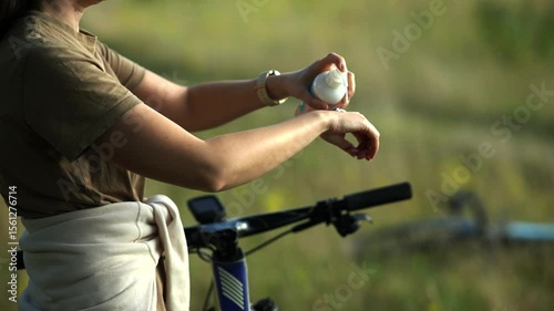 Woman applying sunscreen to her body. Healthy skin	