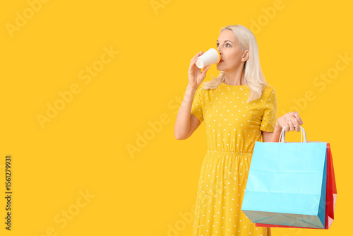Mature woman with shopping ...