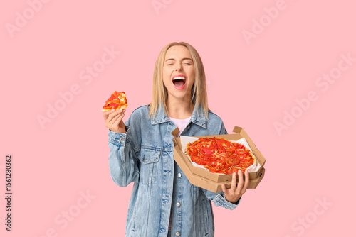 Young happy woman holding c...