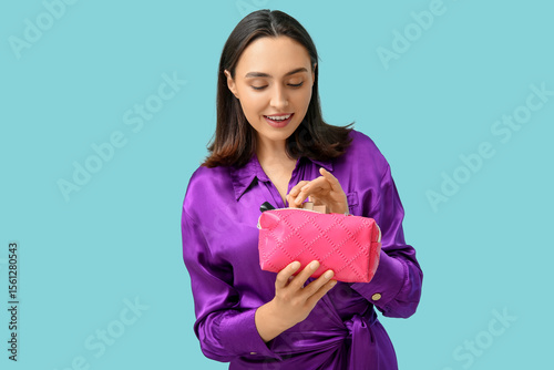 Beautiful young woman with ...