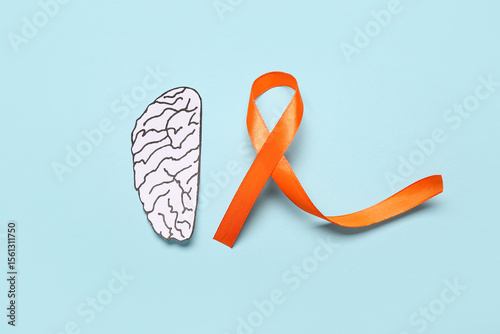 Paper brain and orange ribb...