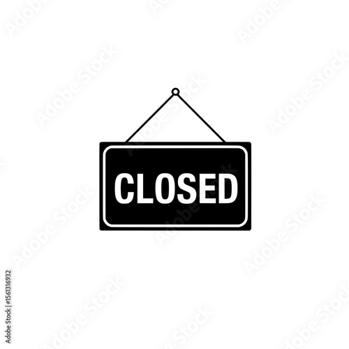 Closed sign hanging on wall   