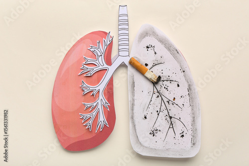 Paper lungs with cigarette ...