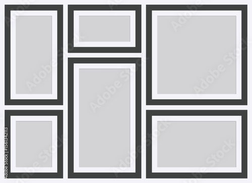 A layout displaying multiple grey and black frames organized in a contemporary, symmetrical collage style. Suitable for artwork visualization, design mockups, or decorative inspiration with a minimali