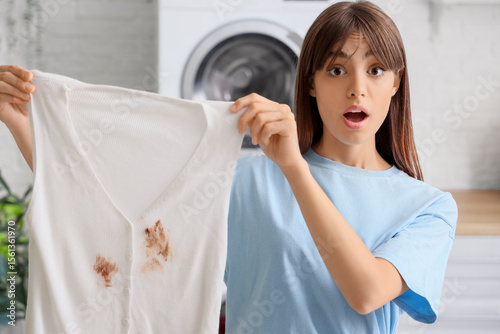Shocked young woman with st...