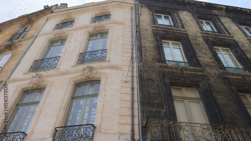 comparison of wall building street facade before and after cleaning with real difference between cleaned and dirty house 
