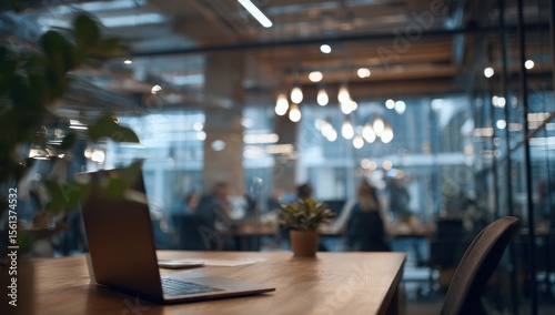 Wallpaper Mural Laptop on a table in a blurred modern office Torontodigital.ca