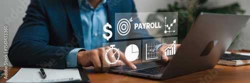 Wallpaper Mural Businessperson working on payroll management on a laptop. Torontodigital.ca