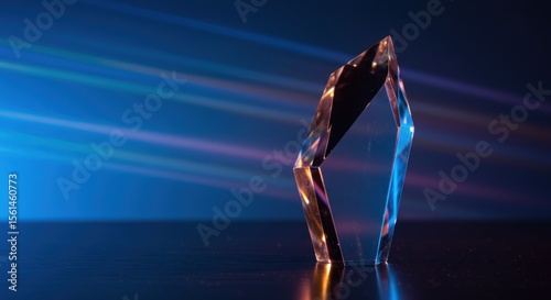 Abstract crystal object in dramatic lighting evokes success and sophistication concept