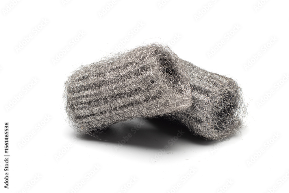 Fototapeta premium Steel wool, also known as iron wool or wire sponge. commonly used as an abrasive for cleaning, polishing, and surface preparation. isolated in white background.