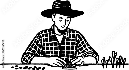 Farmer arranging seed packets at table with plants for garden planning