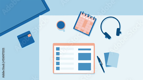 Overhead view of a desk with monitor, notepad, headphones, tablet, pen, and coffee cup arrangement