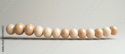 Smooth, light beige spheres. AI.