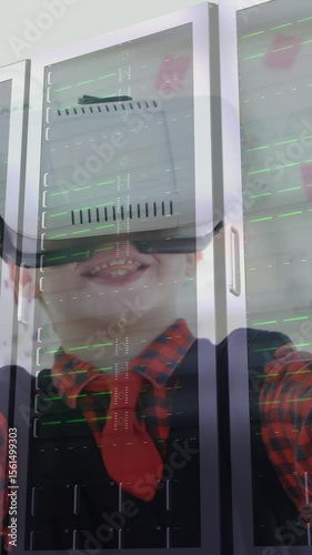 Child using virtual reality headset over data servers in technology environment