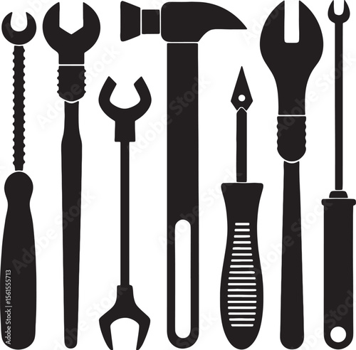 Collection of silhouetted hand tools including a hammer and wrenches	