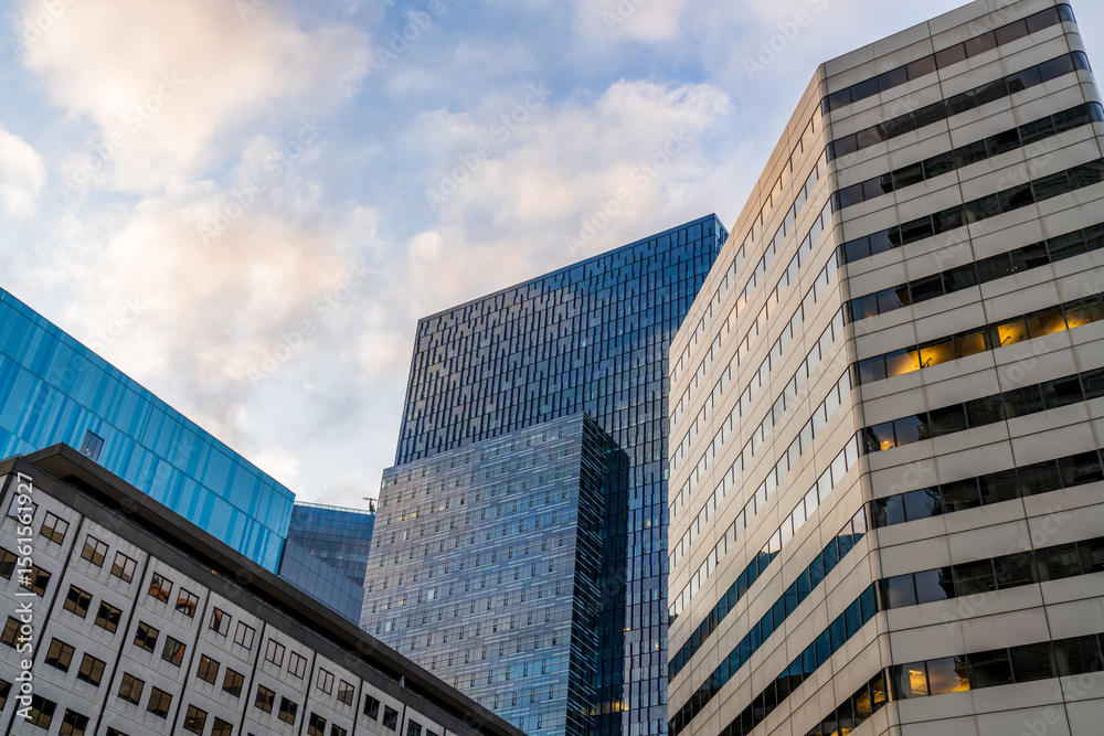 Obraz premium Modern office building in Seattle, United states, at sunrise, blue and grey colored windows
