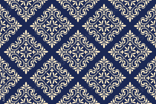 Floral pattern. Seamless vector background. Vintage wallpaper in the Baroque style. Golden and dark blue ornament for fabric, wallpaper, packaging. Ornate Damask flower illustration