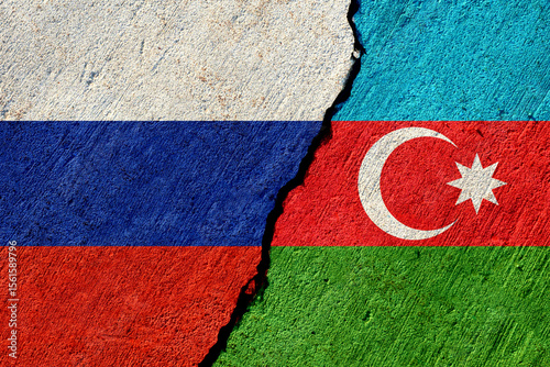 russian and azerbaijani flags painted on concrete wall