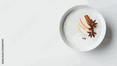 Creamy dessert with cinnamon and star anise in white bowl  
