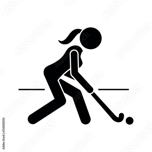 Female Field Hockey Player in Action with Stick and Ball