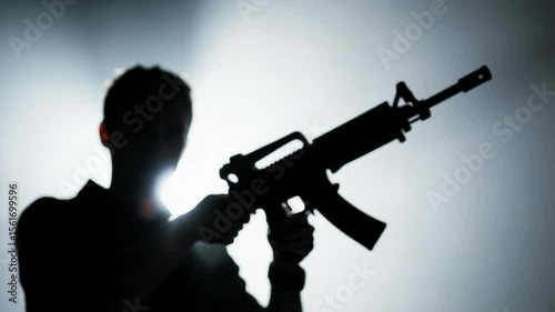 Shadowy Figure with Assault Rifle. True Crime. Shadow Horror Thriller.