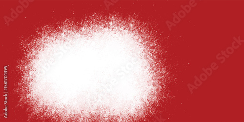 Spray paint texture in white overlaying red background


