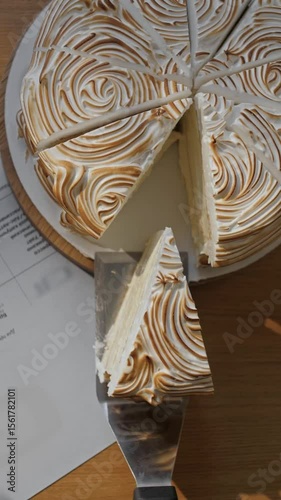 delicious meringue cake cut into slices top view