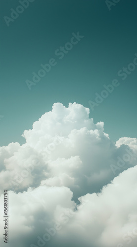 Clouds drifting softly against a blue sky, creating a serene and tranquil atmosphere above an endless horizon during daytime