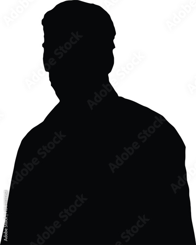 Silhouette of a Man Standing and Looking Over His Shoulder