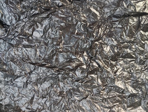 crumpled black plastic bag texture and background