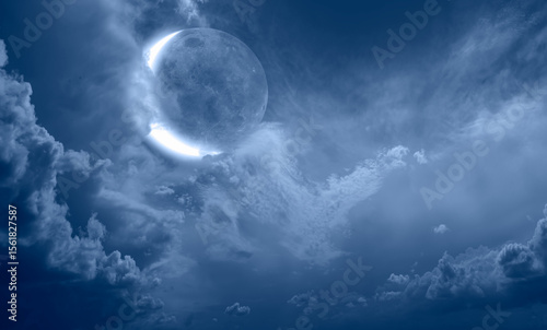 Fototapeta Naklejka Na Ścianę i Meble -  Night sky with full bright crescent moon in the clouds 