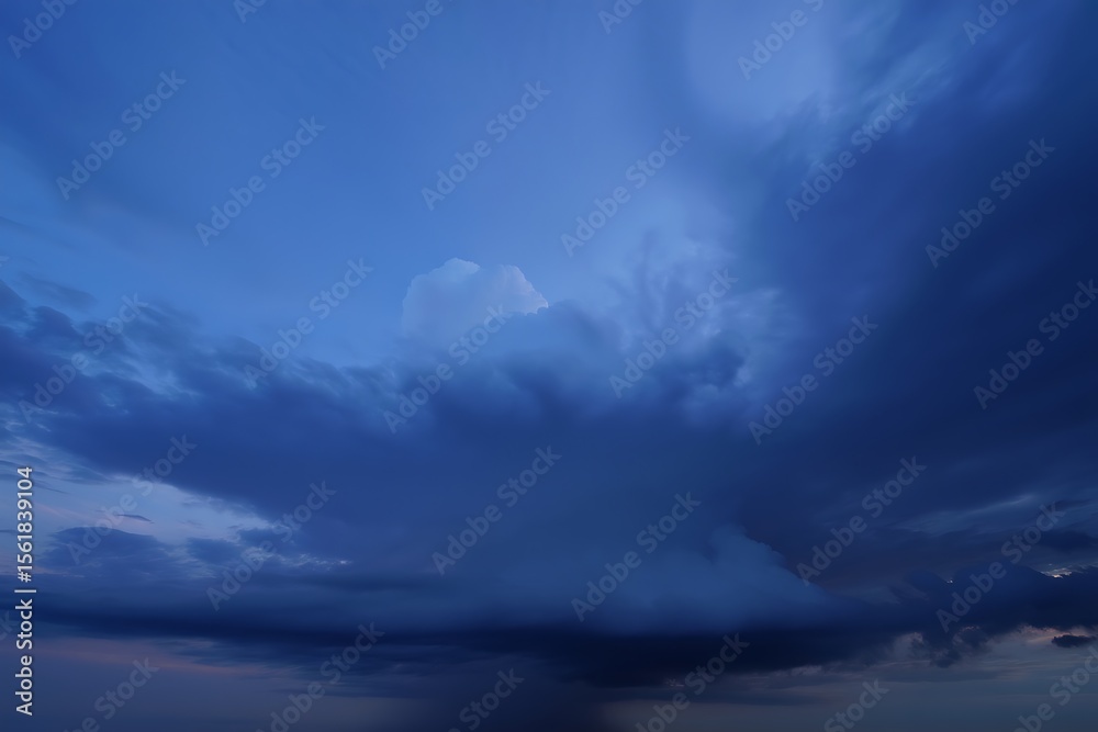 Obraz premium Deep blue storm clouds gathering in the sky dark